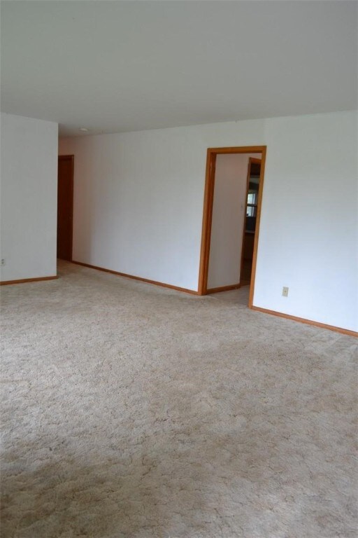 420 Natchez Trace Dr, Harrison, AR 72601 - empty room with baseboards and light carpet
