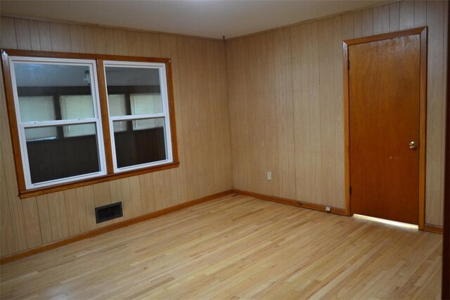 420 Natchez Trace Dr, Harrison, AR 72601 - spare room with wood finished floors and wood walls