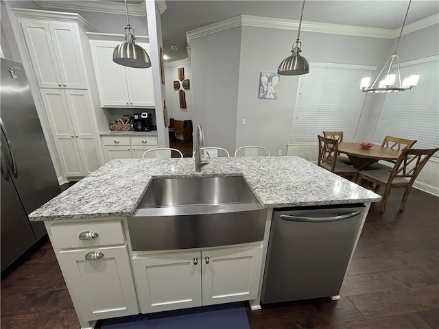 773 Via Firenze Ave, Tontitown, AR 72762 - kitchen with freestanding refrigerator, a sink, pendant lighting, ornamental molding, and white cabinets