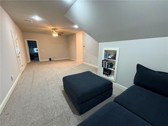 773 Via Firenze Ave, Tontitown, AR 72762 - living room with built in features, light colored carpet, a ceiling fan, and baseboards