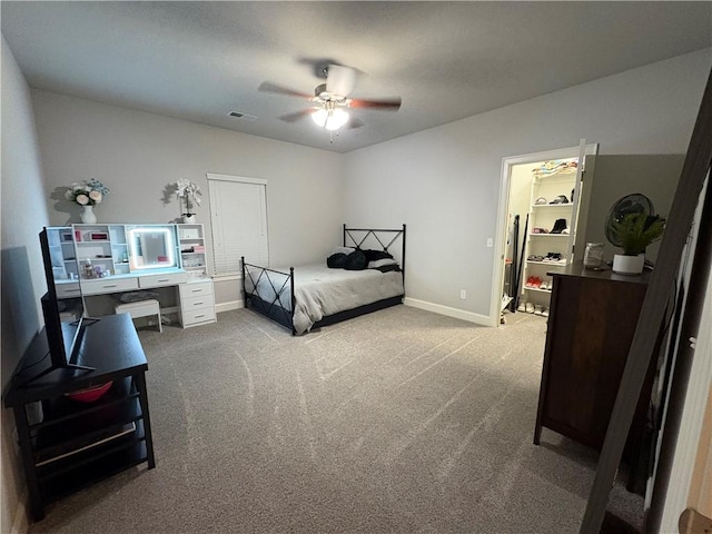 773 Via Firenze Ave, Tontitown, AR 72762 - carpeted bedroom with baseboards, a closet, and a ceiling fan