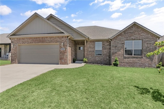 1610 N Skyline Loop, Centerton, AR 72719 - view of front of home featuring concrete driveway, a front yard, brick siding, an attached garage, and board and batten siding