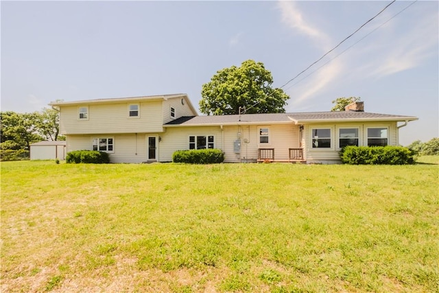 18880 Skylight Mountain Rd, Canehill, AR 72717 - back of property featuring a chimney and a lawn
