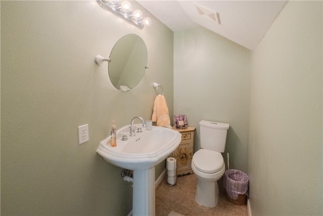 18880 Skylight Mountain Rd, Canehill, AR 72717 - half bath featuring toilet, tile patterned floors, lofted ceiling, and a sink