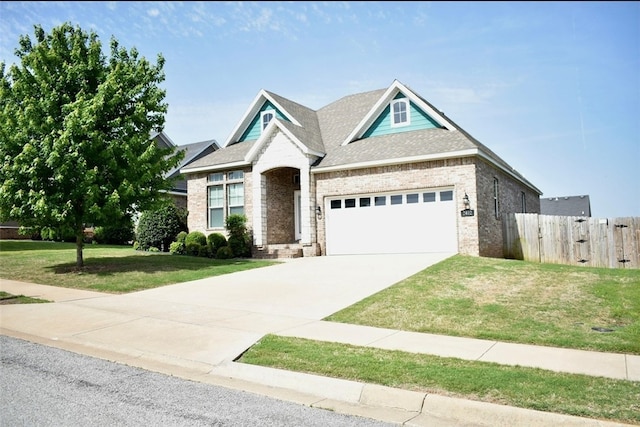 2402 N Brook Ln, Siloam Springs, AR 72761 - view of front of house featuring brick siding, concrete driveway, a garage, and a shingled roof
