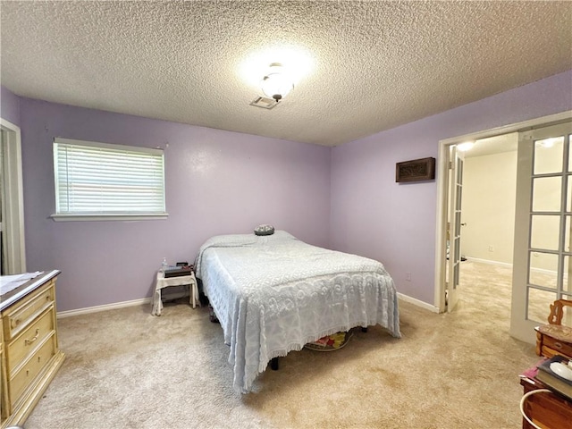 505 10th St, Bentonville, AR 72712 - bedroom with light carpet, a textured ceiling, and baseboards