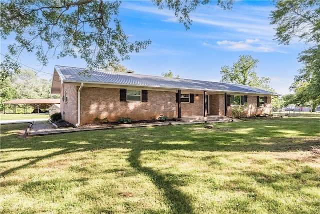 125 E Orchard Ln, Rogers, AR 72756 - single story home featuring brick siding, a front yard, and metal roof