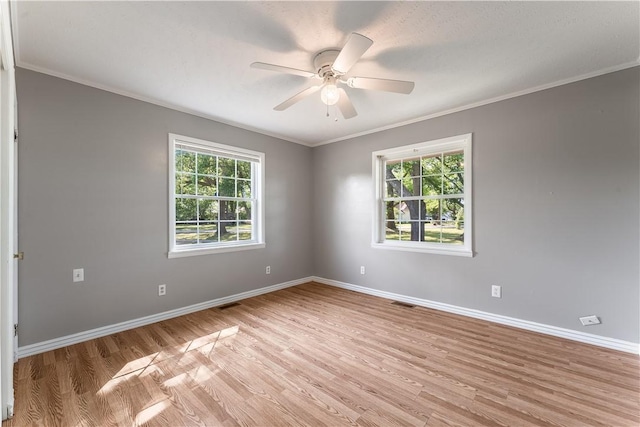 125 E Orchard Ln, Rogers, AR 72756 - unfurnished room featuring baseboards, light wood-style floors, and crown molding