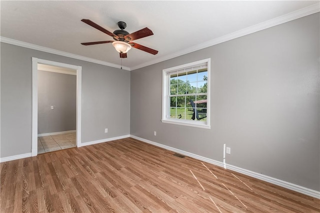 125 E Orchard Ln, Rogers, AR 72756 - unfurnished room featuring ceiling fan, baseboards, crown molding, and light wood-type flooring