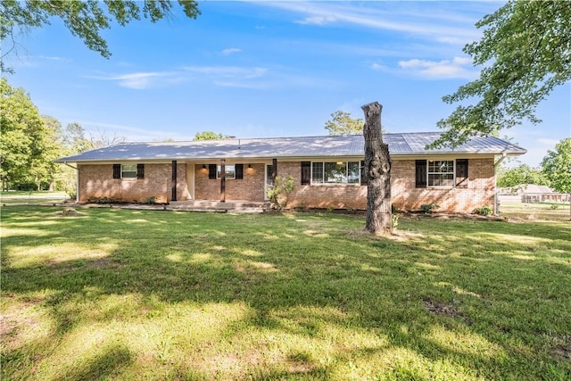 125 E Orchard Ln, Rogers, AR 72756 - ranch-style home featuring a front lawn and brick siding
