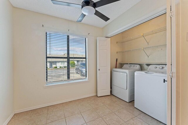 16 Eleanor Ln, Bella Vista, AR 72714 - clothes washing area with washer and dryer, ceiling fan, baseboards, light tile patterned floors, and a textured ceiling