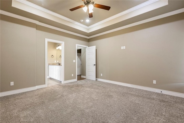 506 Hindman Dr, Prairie Grove, AR 72753 - unfurnished bedroom featuring carpet flooring, ornamental molding, a raised ceiling, connected bathroom, and baseboards