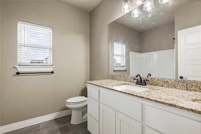 506 Hindman Dr, Prairie Grove, AR 72753 - full bath with baseboards, vanity, toilet, and tile patterned floors