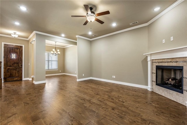 506 Hindman Dr, Prairie Grove, AR 72753 - unfurnished living room with a ceiling fan, a tile fireplace, dark wood-style floors, a chandelier, and crown molding