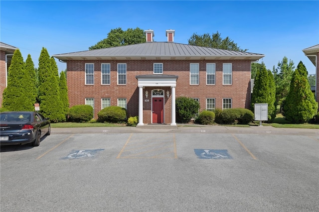 413 Columbia Pl, Lowell, AR 72745 - view of building exterior with uncovered parking
