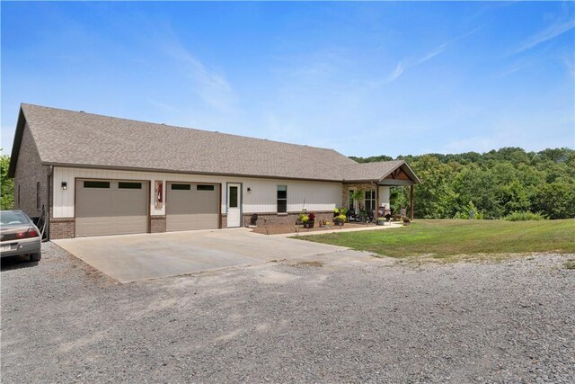 13812 Sunburst Ln, Gravette, AR 72736 - single story home with brick siding, driveway, a garage, roof with shingles, and a front lawn