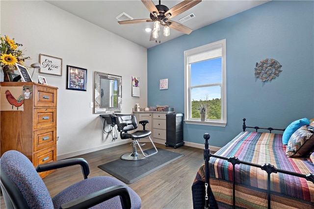 13812 Sunburst Ln, Gravette, AR 72736 - bedroom with baseboards, wood finished floors, and ceiling fan