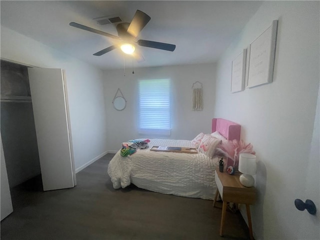 401 Walnut St, Clarksville, AR 72830 - bedroom featuring ceiling fan and baseboards