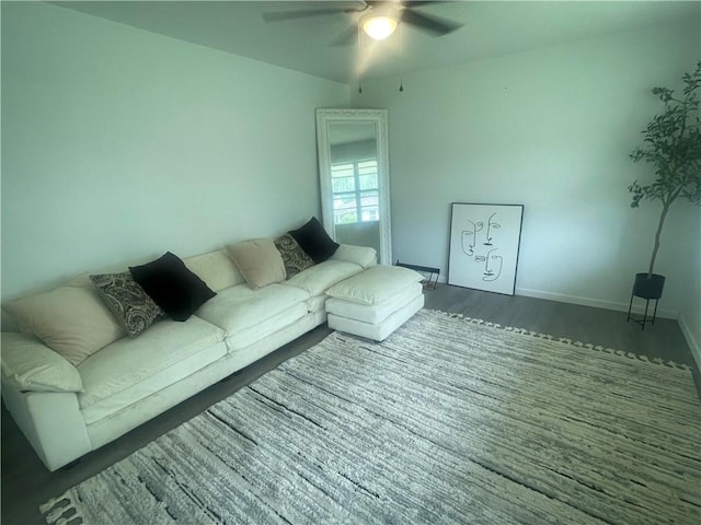 401 Walnut St, Clarksville, AR 72830 - living area featuring ceiling fan and wood finished floors
