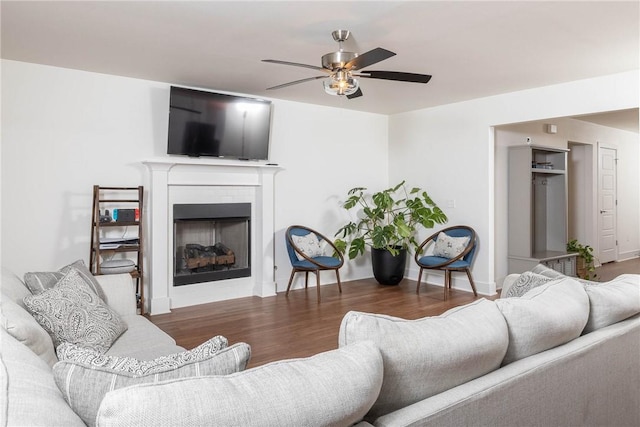 2758 Suncrest Ave, Springdale, AR 72764 - living room with ceiling fan, a fireplace, wood finished floors, and baseboards