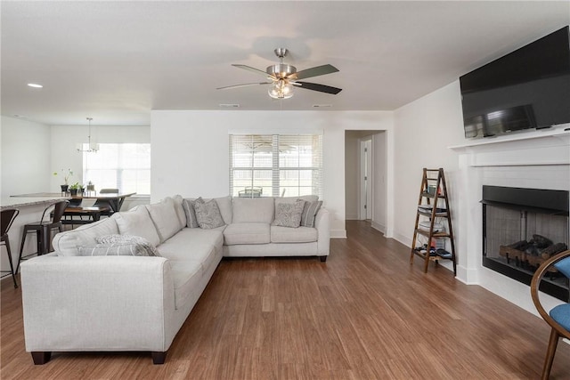 2758 Suncrest Ave, Springdale, AR 72764 - living room featuring wood finished floors, a ceiling fan, a fireplace, baseboards, and recessed lighting