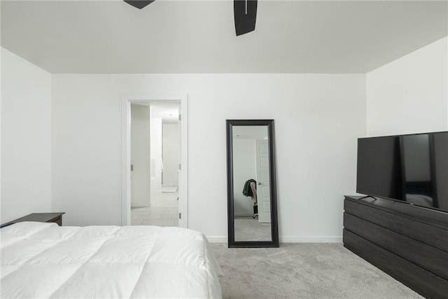 2758 Suncrest Ave, Springdale, AR 72764 - bedroom with light carpet, baseboards, ensuite bathroom, and a ceiling fan