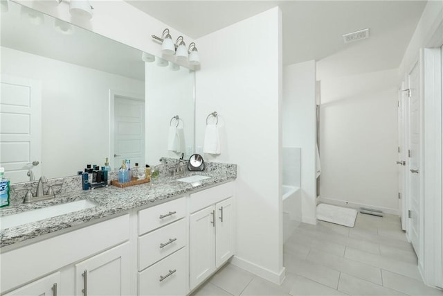 2758 Suncrest Ave, Springdale, AR 72764 - bathroom with tile patterned floors, double vanity, a bathtub, baseboards, and a shower