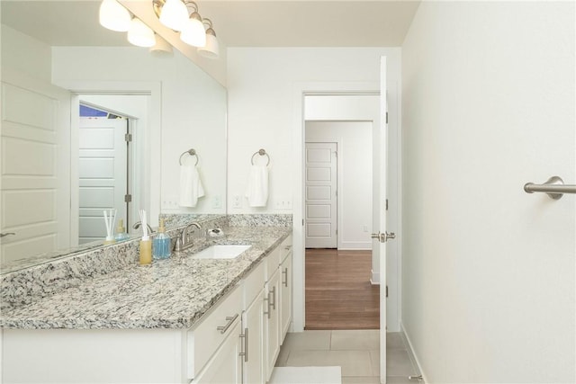 2758 Suncrest Ave, Springdale, AR 72764 - bathroom featuring vanity, tile patterned flooring, and baseboards