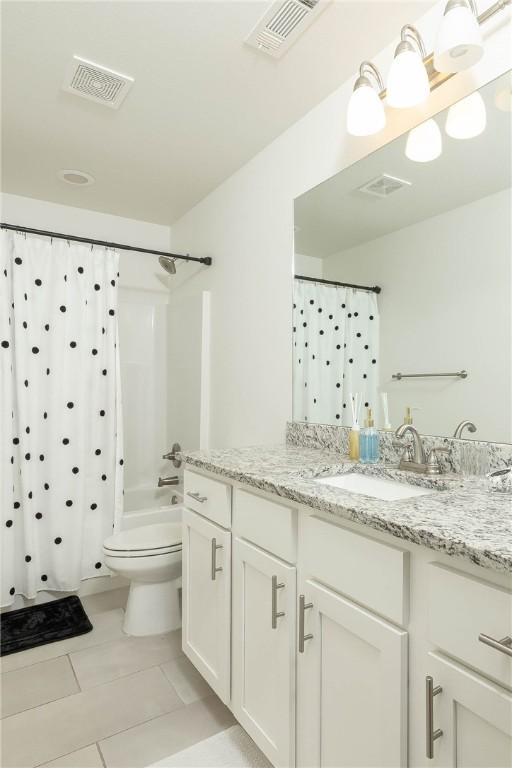 2758 Suncrest Ave, Springdale, AR 72764 - full bathroom with toilet, tile patterned flooring, vanity, and shower / bath combo with shower curtain