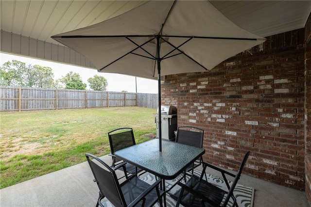 2758 Suncrest Ave, Springdale, AR 72764 - view of patio / terrace featuring a grill and outdoor dining space