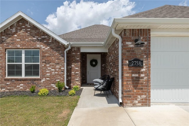 2758 Suncrest Ave, Springdale, AR 72764 - property entrance featuring a shingled roof, brick siding, a garage, and a lawn