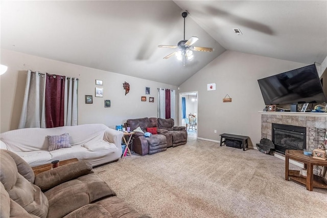 1329 Homestead Ln, West Fork, AR 72774 - carpeted living area featuring a ceiling fan, vaulted ceiling, and a tiled fireplace