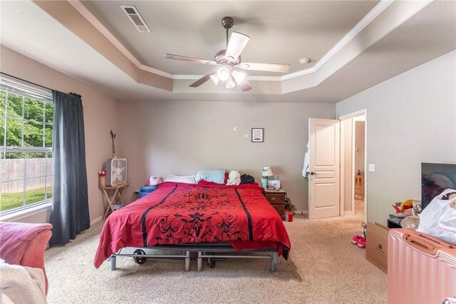 1329 Homestead Ln, West Fork, AR 72774 - bedroom featuring a tray ceiling, carpet flooring, crown molding, and ceiling fan