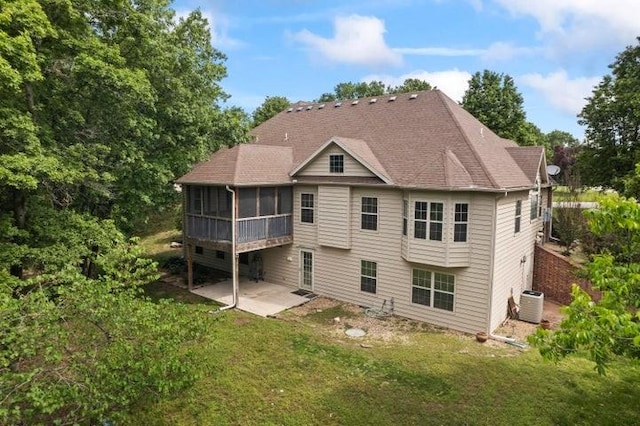 1878 Morning Side Falls Blvd, Blue Eye, MO 65611 - back of house with a patio area, a sunroom, central air condition unit, and a lawn