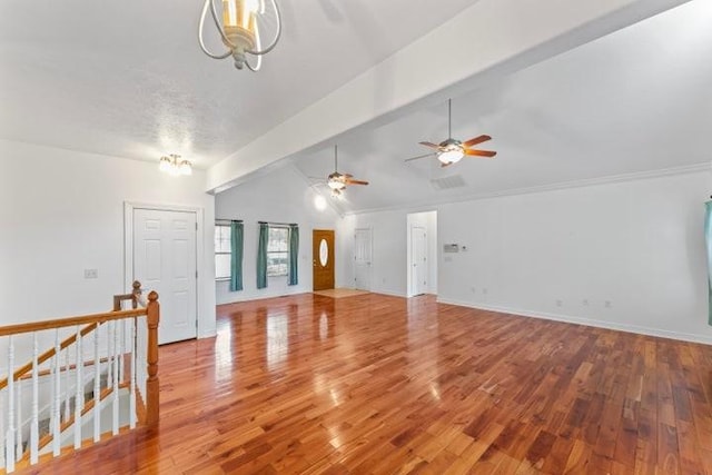 1878 Morning Side Falls Blvd, Blue Eye, MO 65611 - unfurnished living room with vaulted ceiling, wood finished floors, and ceiling fan