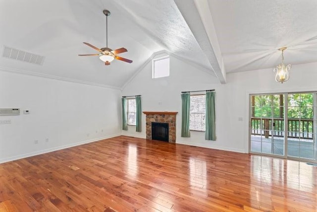 1878 Morning Side Falls Blvd, Blue Eye, MO 65611 - unfurnished living room featuring a ceiling fan, vaulted ceiling, wood finished floors, baseboards, and a fireplace