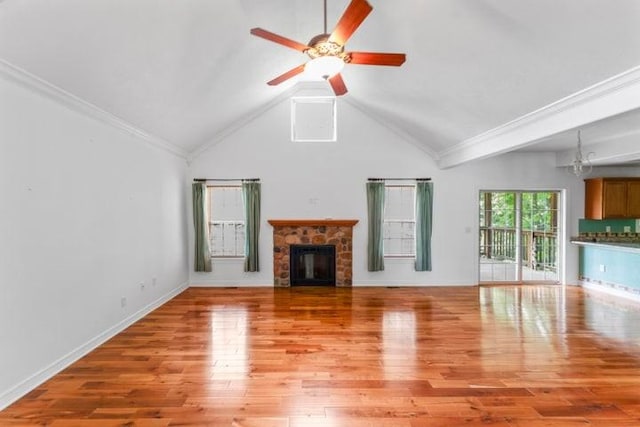 1878 Morning Side Falls Blvd, Blue Eye, MO 65611 - unfurnished living room with light wood-type flooring, a fireplace, ceiling fan, ornamental molding, and high vaulted ceiling
