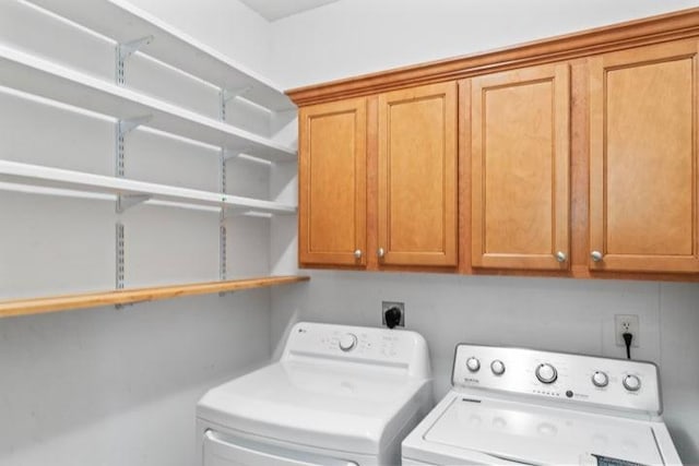 1878 Morning Side Falls Blvd, Blue Eye, MO 65611 - laundry room featuring washer and clothes dryer and cabinet space