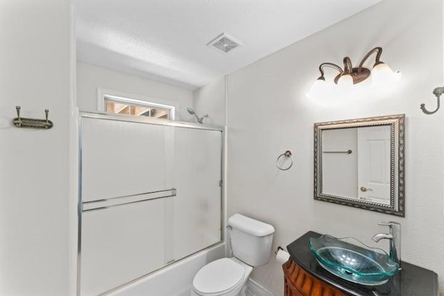 1878 Morning Side Falls Blvd, Blue Eye, MO 65611 - full bath featuring toilet, vanity, enclosed tub / shower combo, and baseboards