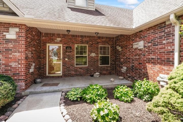 1878 Morning Side Falls Blvd, Blue Eye, MO 65611 - property entrance featuring roof with shingles and brick siding
