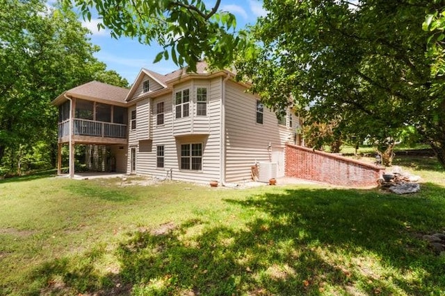 1878 Morning Side Falls Blvd, Blue Eye, MO 65611 - back of property featuring a sunroom and a lawn