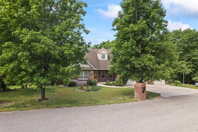 1878 Morning Side Falls Blvd, Blue Eye, MO 65611 - view of front of property with driveway, a front lawn, and brick siding