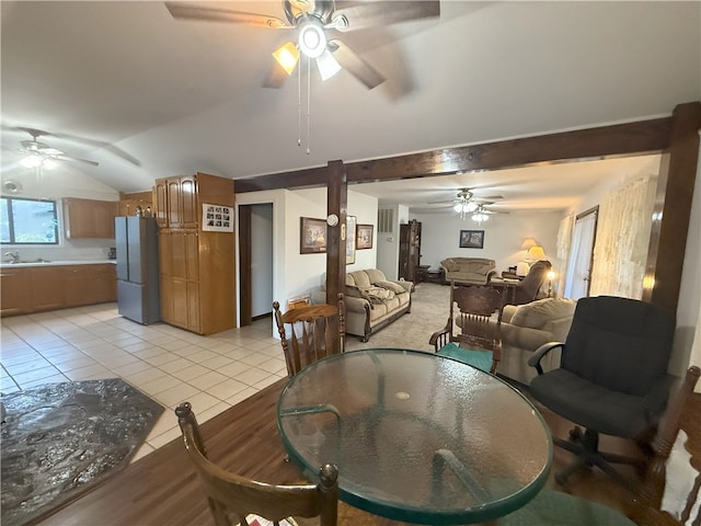 1088 Little Red River Rd, Leslie, AR 72645 - dining room with ceiling fan, light tile patterned floors, and vaulted ceiling