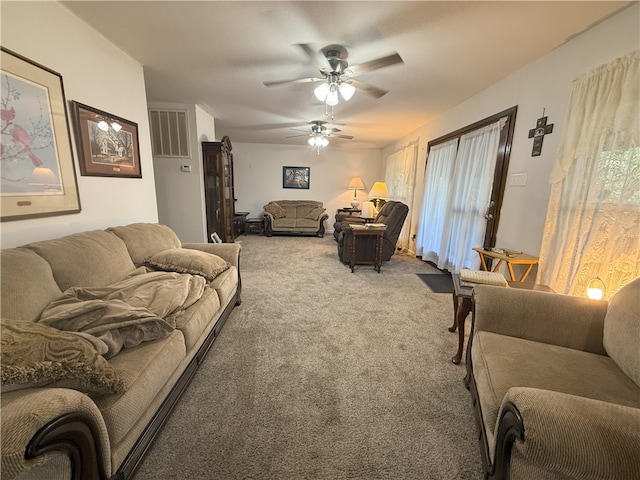 1088 Little Red River Rd, Leslie, AR 72645 - living area featuring light carpet, ceiling fan, and healthy amount of natural light