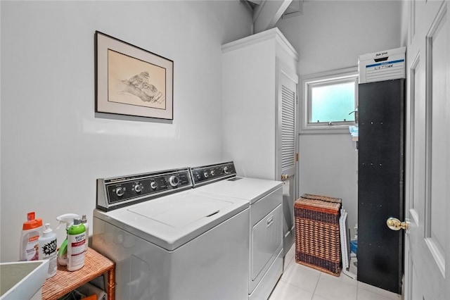 24 Dogwood Rdg, Eureka Springs, AR 72632 - clothes washing area with separate washer and dryer and light tile patterned flooring