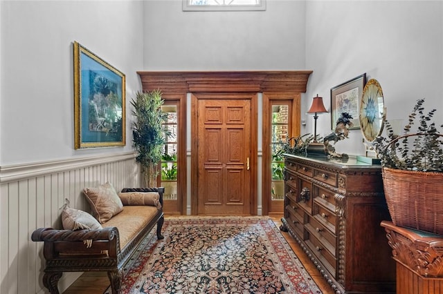 24 Dogwood Rdg, Eureka Springs, AR 72632 - foyer entrance with wood finished floors and a towering ceiling