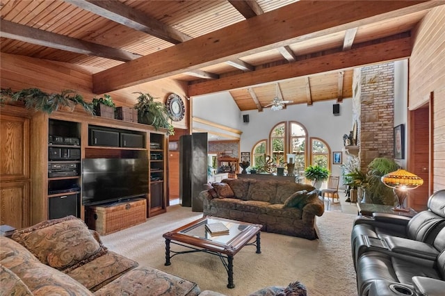 24 Dogwood Rdg, Eureka Springs, AR 72632 - living area with light carpet, wooden ceiling, beamed ceiling, a fireplace, and high vaulted ceiling