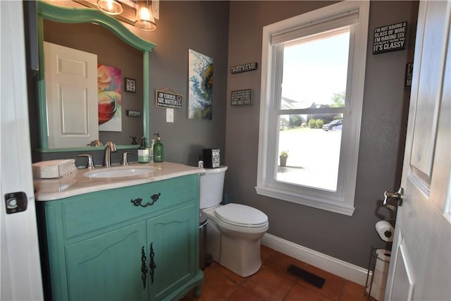 8141 Ward Ln, Rogers, AR 72756 - half bathroom featuring toilet, vanity, tile patterned floors, and baseboards