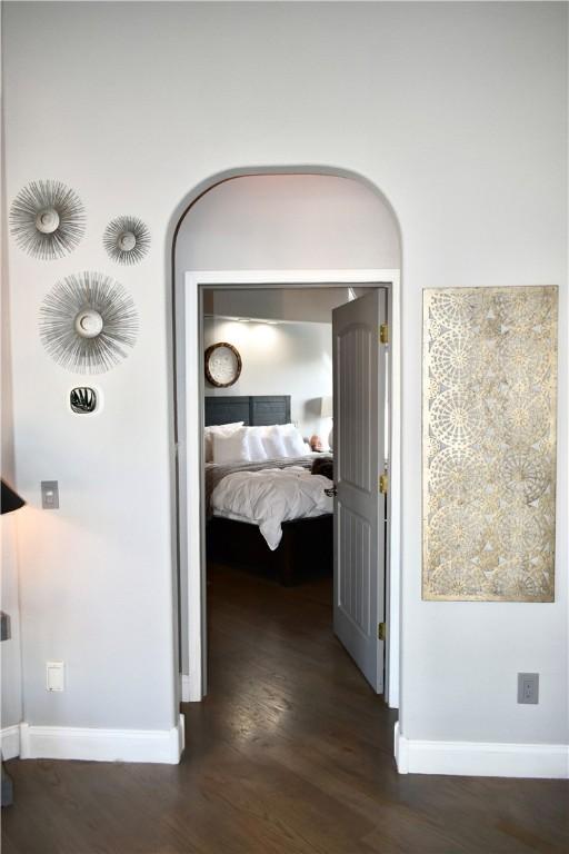 8141 Ward Ln, Rogers, AR 72756 - corridor featuring wood finished floors and baseboards