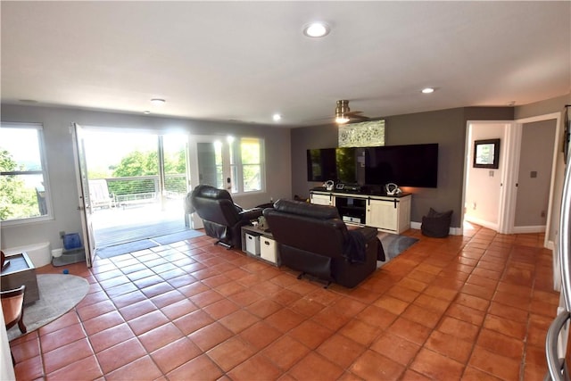 8141 Ward Ln, Rogers, AR 72756 - living area featuring light tile patterned floors, recessed lighting, ceiling fan, and baseboards
